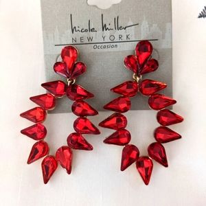 Nicole Miller earrings with red rhinestones